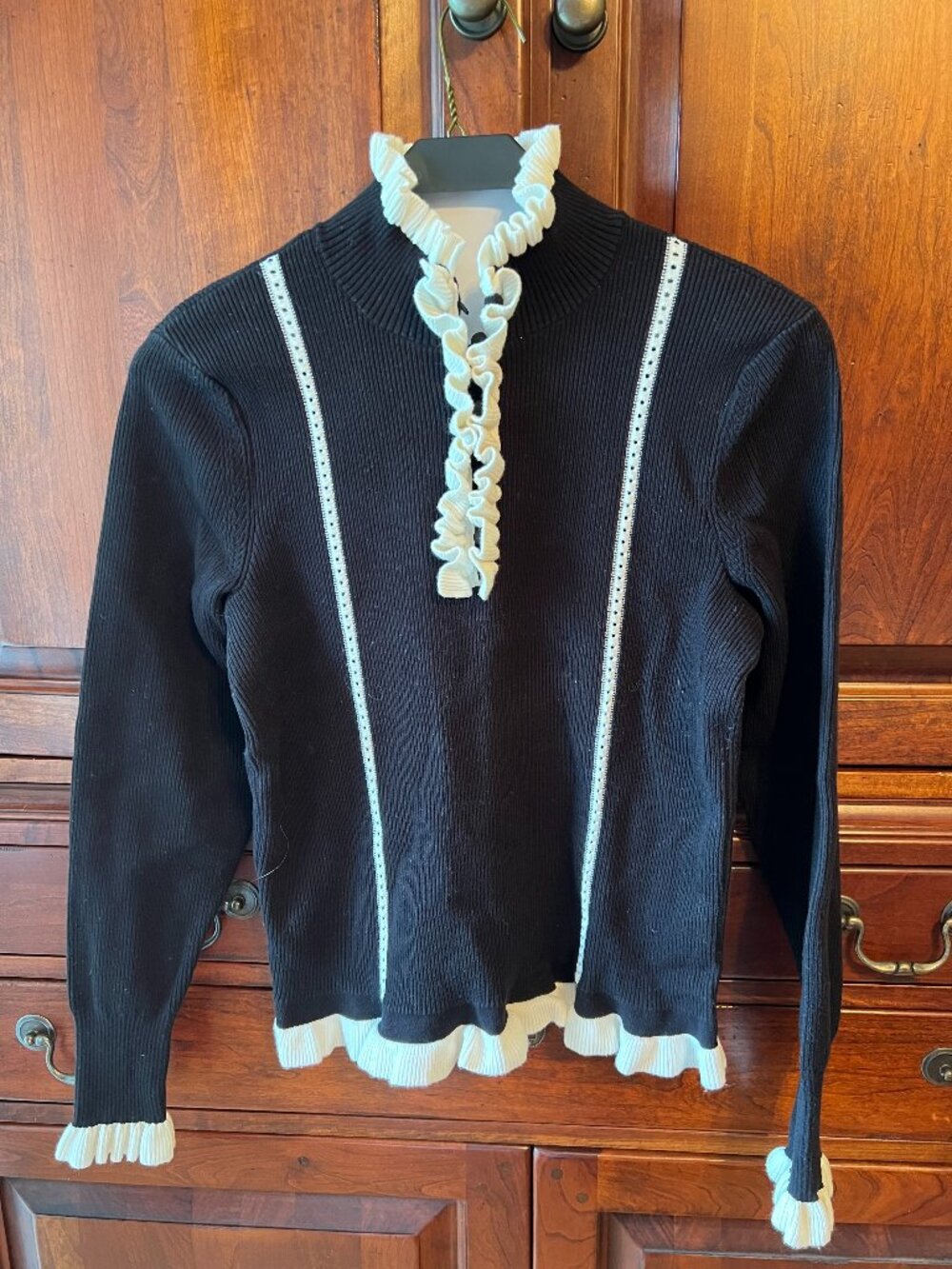 CAbi sweater black and cream with ruffle detail size small